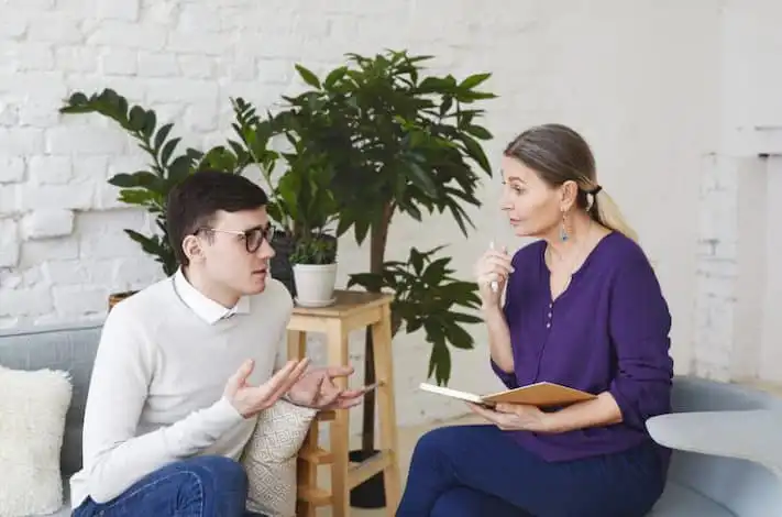 Therapist and client discussing anxiety issues in Indonesia.